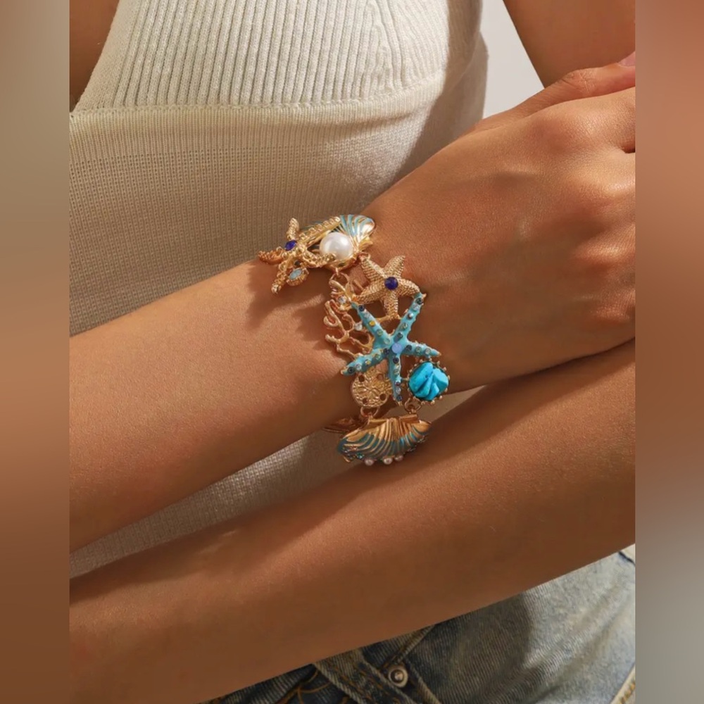 Elegant Ocean-Inspired Bracelet with Gold and Blue Accents